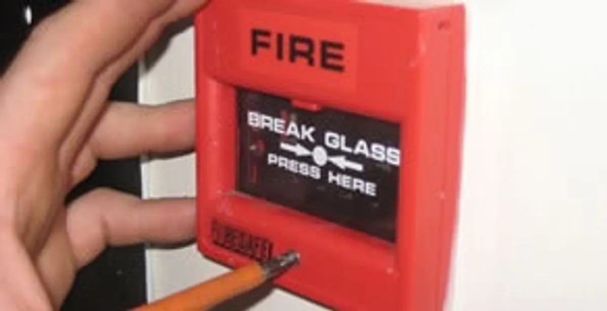 fire alarm installation service showing manual fire alarm pull station installed by licensed electricians in Memphis, TN
