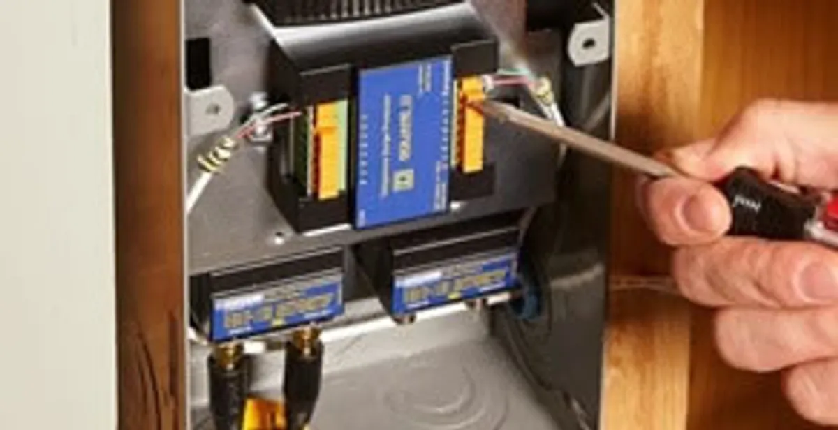 Whole home surge protection device being installed by a licensed electrician to protect electrical systems in Memphis, TN